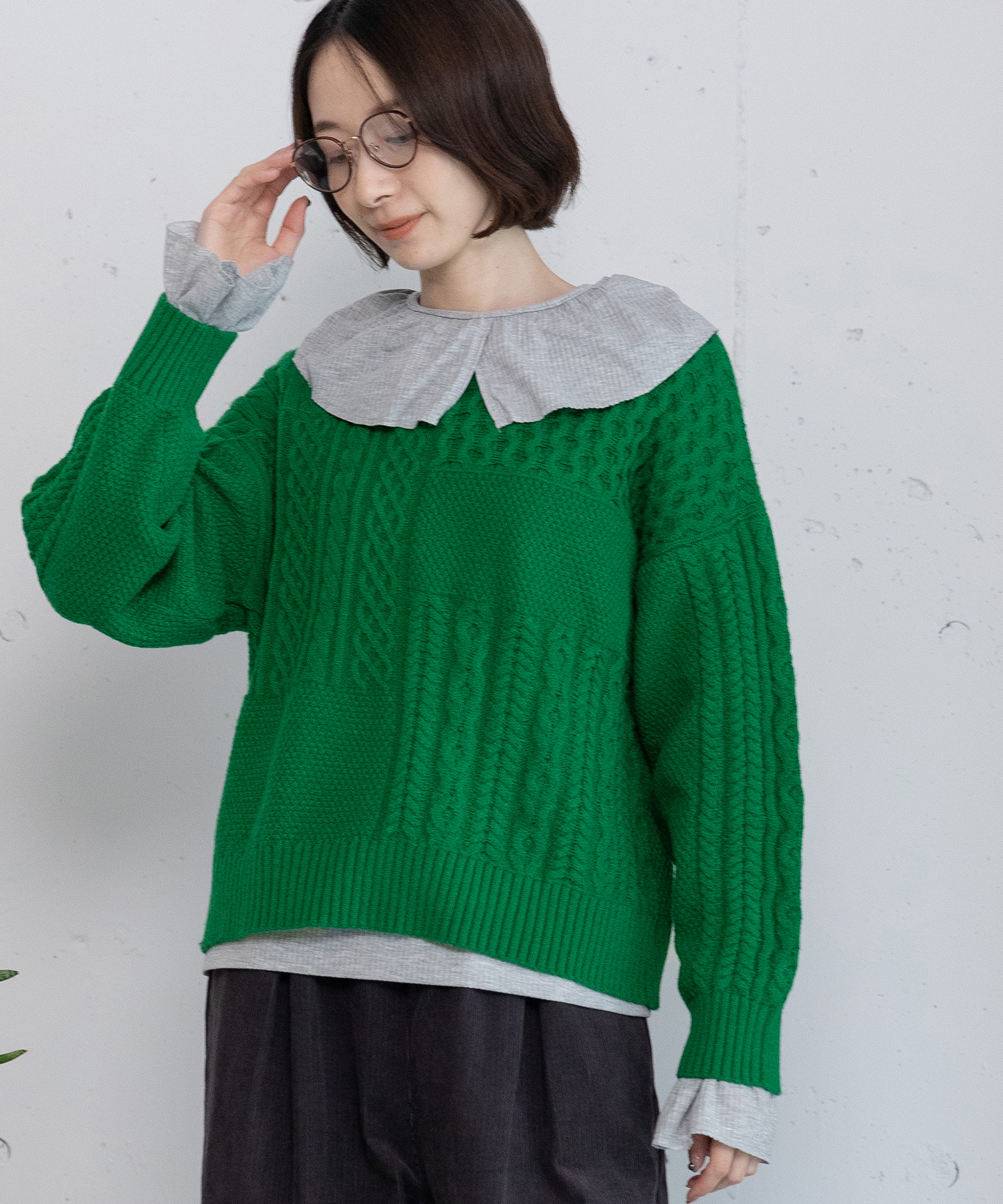 パッチワーク風ケーブルニット