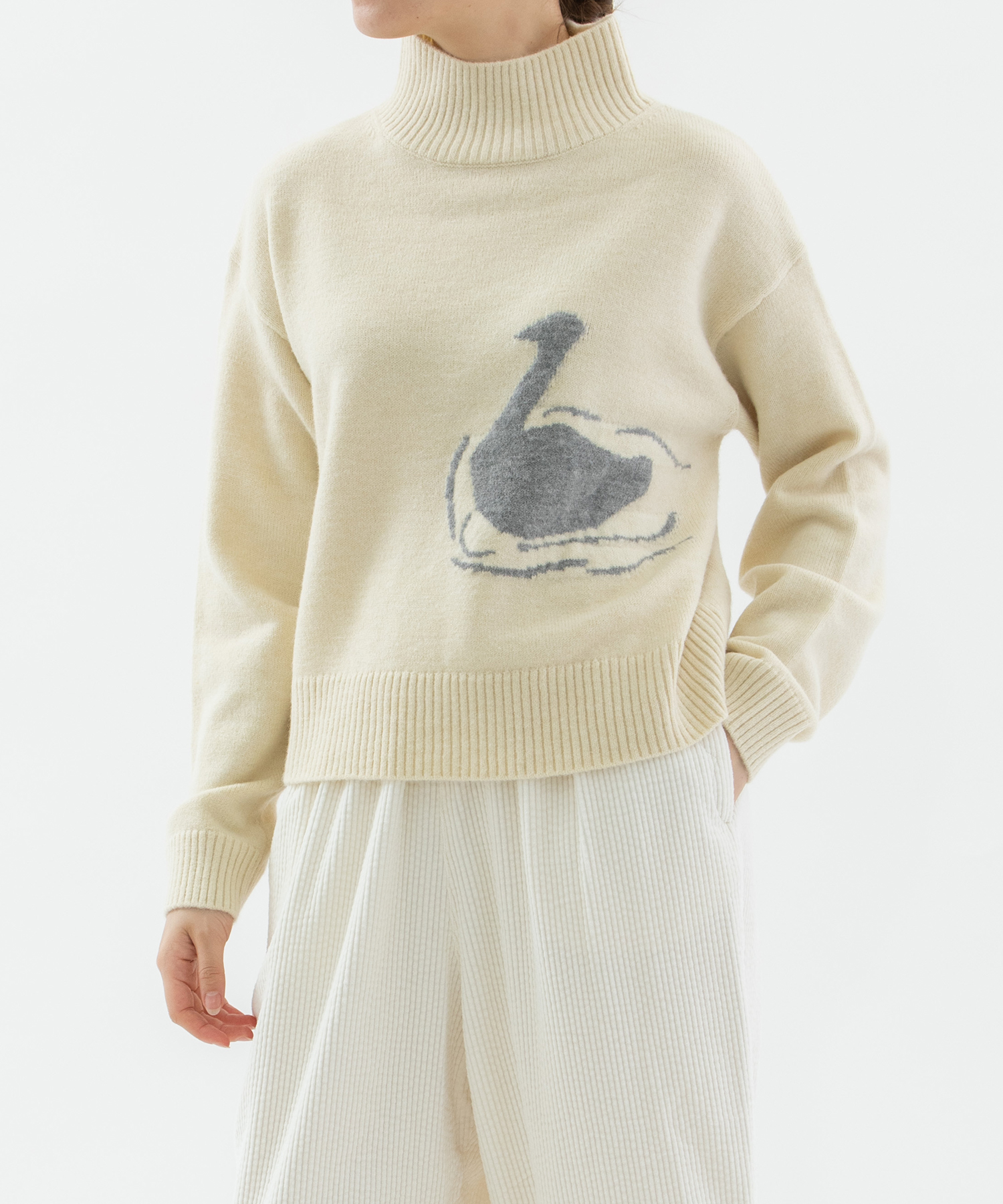 スワンインターシャハイネックセーター